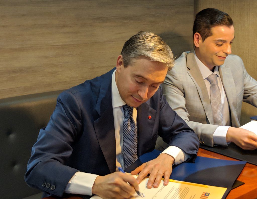 The Honourable François-Philippe Champagne, Minister of International Trade, signing the CPTPP on March 8, 2018